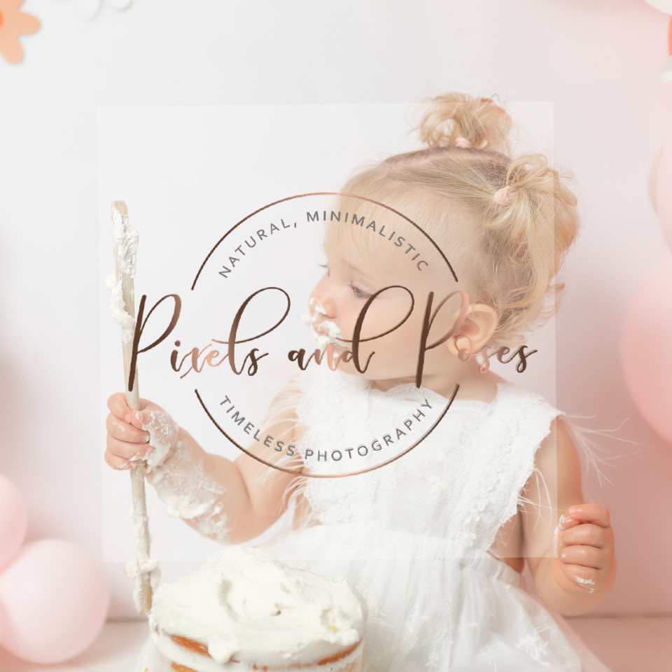 Soft pink balloon cake smash setup for first birthday girl in Derby