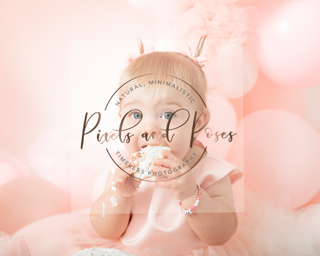 Sweet pastel pink styling for the cutest first birthday photographs at Pixels and Poses.