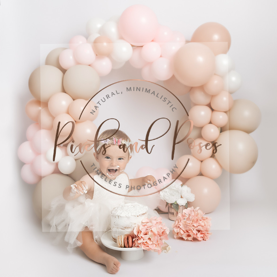 Neutral pink and beige balloon hoop first birthday cake smash photography