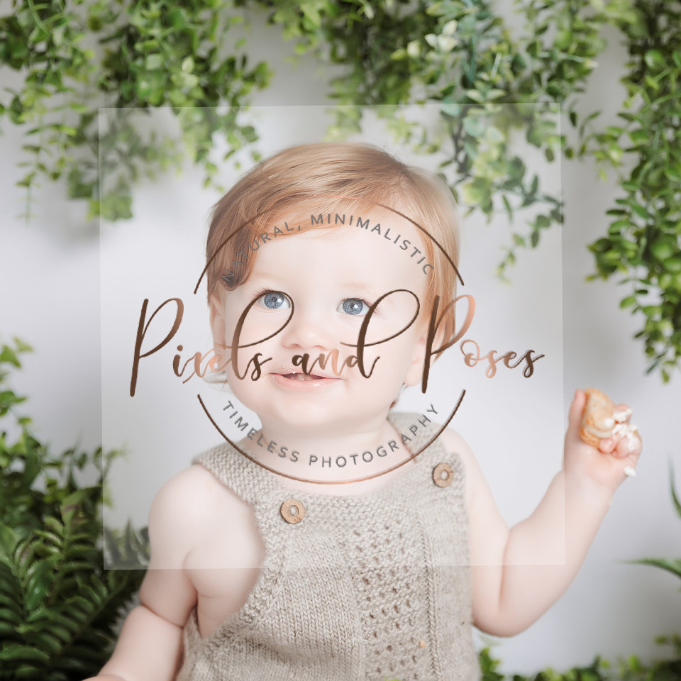 Neutral greenery cake smash photography with eucalyptus styling in Derby studio